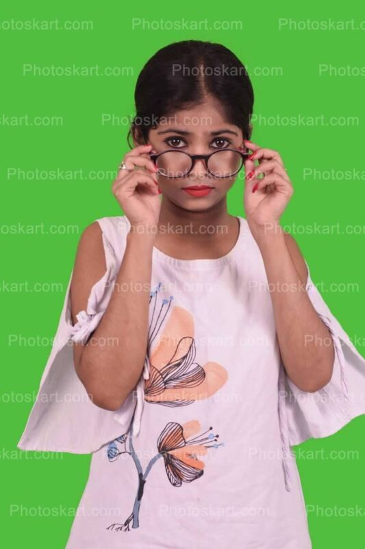 DG92323980922, smart indian girl try to see through her eye glass stock image, soma jalui, indian cute girl, smart cute girl, desi meye, meye, bangali, bengali, bangla, photoshoot, indoor, posing, green background, green screen, stock image, stock photo, royaltyfree stock image, royaltyfree stock photo, white dress, casual posing, casual dress, model, desi model, model, indian model, college girl, teenagers, cute model, indian model with white dress