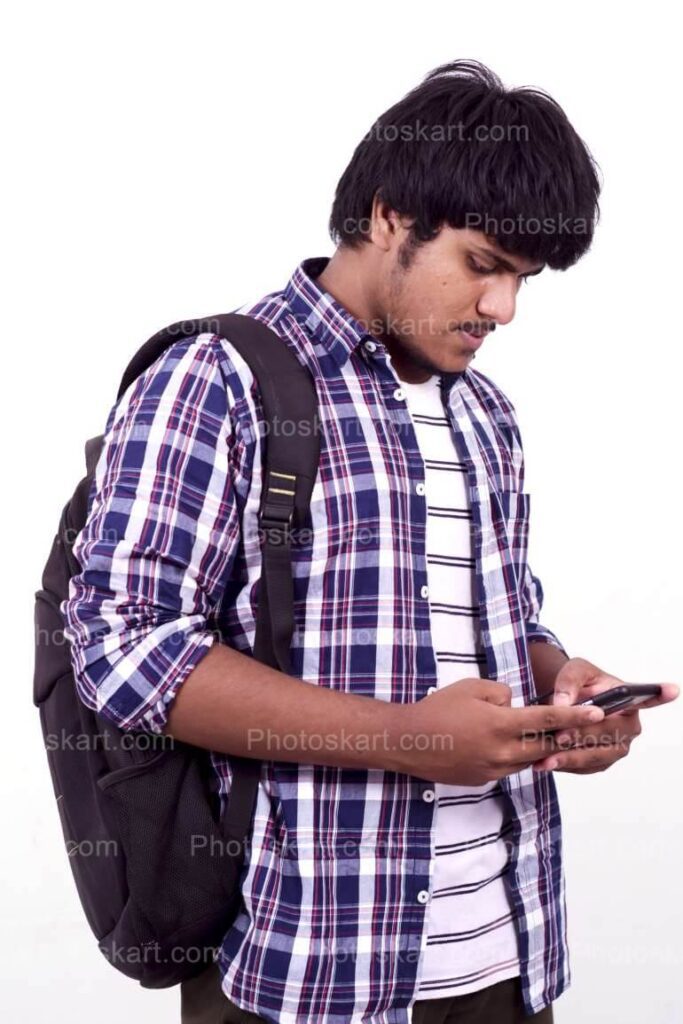 A Boy Checking His Mobile Hd Photo
