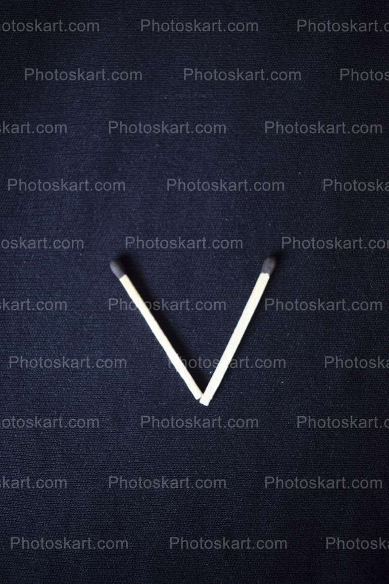 DG83229111222, alphabet v made with wooden matches stock image, alphabet-v-made-with-wooden-matches-stock-image, wooden matches, wooden matches stock images, wooden matches stock photos, deshlai kathi, deshlai stock photos, creative alphabet stock image, creative photoshoot, creative photography, matches stock images, fire, flame, burn, bunch, caution, box, match, flammable, heat, kitchen, light, smoke, stick, wooden, soumen sadhukhan