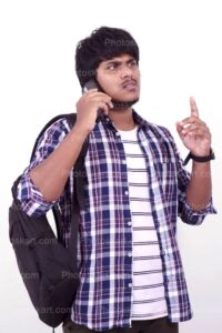 indian-boy-calling-someone-stock-photo
