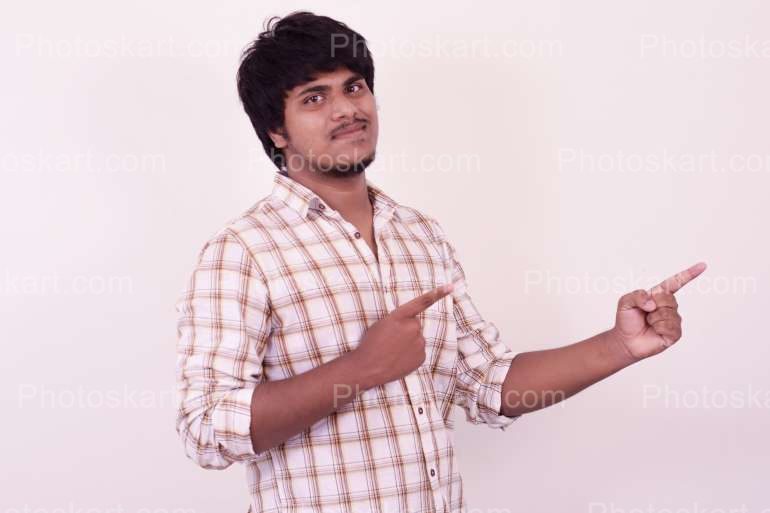 Indian Boy Indicates Something Stock Photo