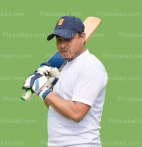 cricket-coach-holding-bat-poses-for-photoshoot
