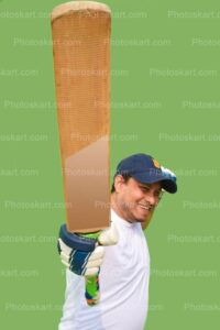 cricket team coach showing bat pose photography